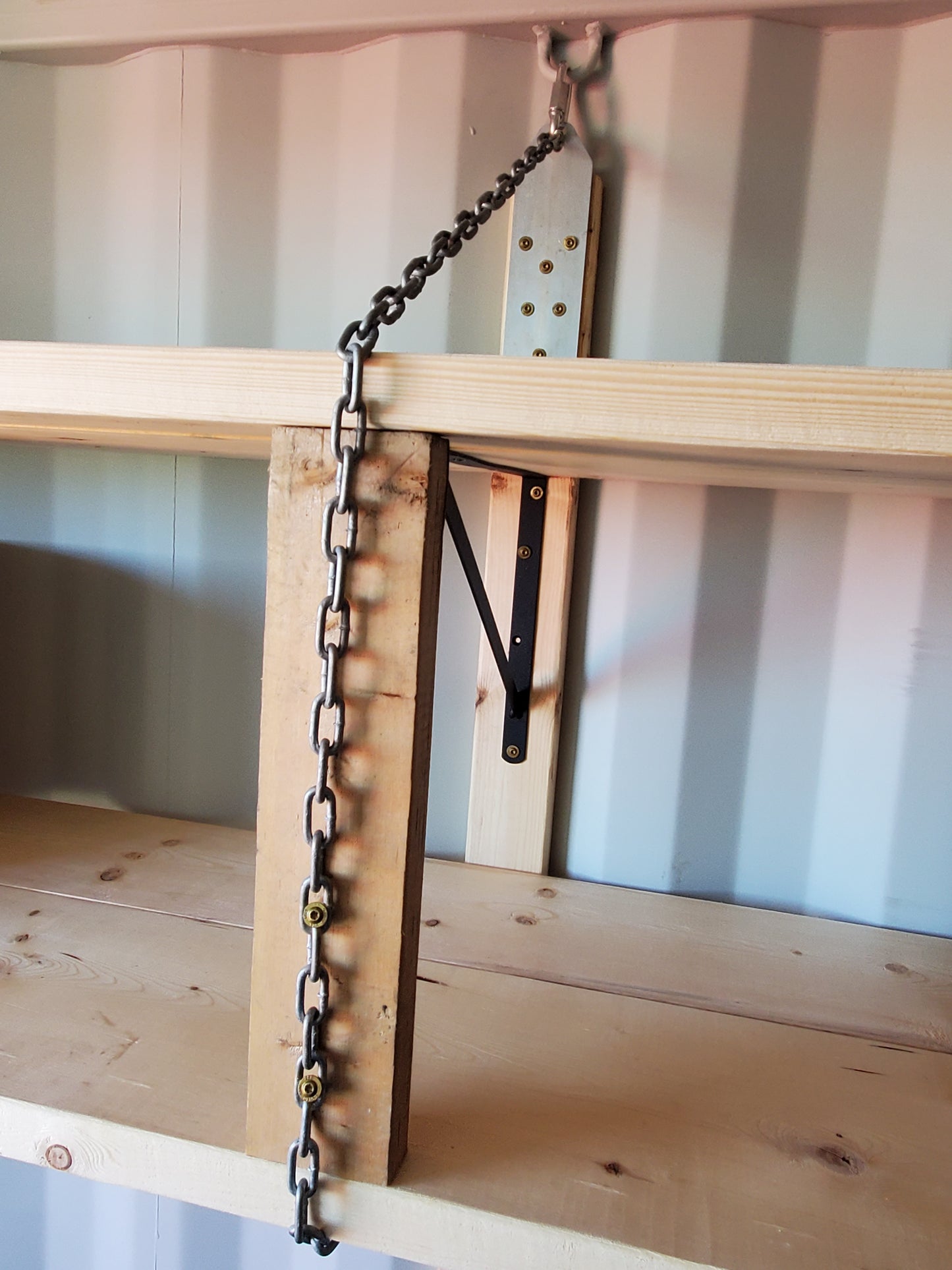3/16" chain providing additional support for shelving in a container, using ZOOM container shelving kits.