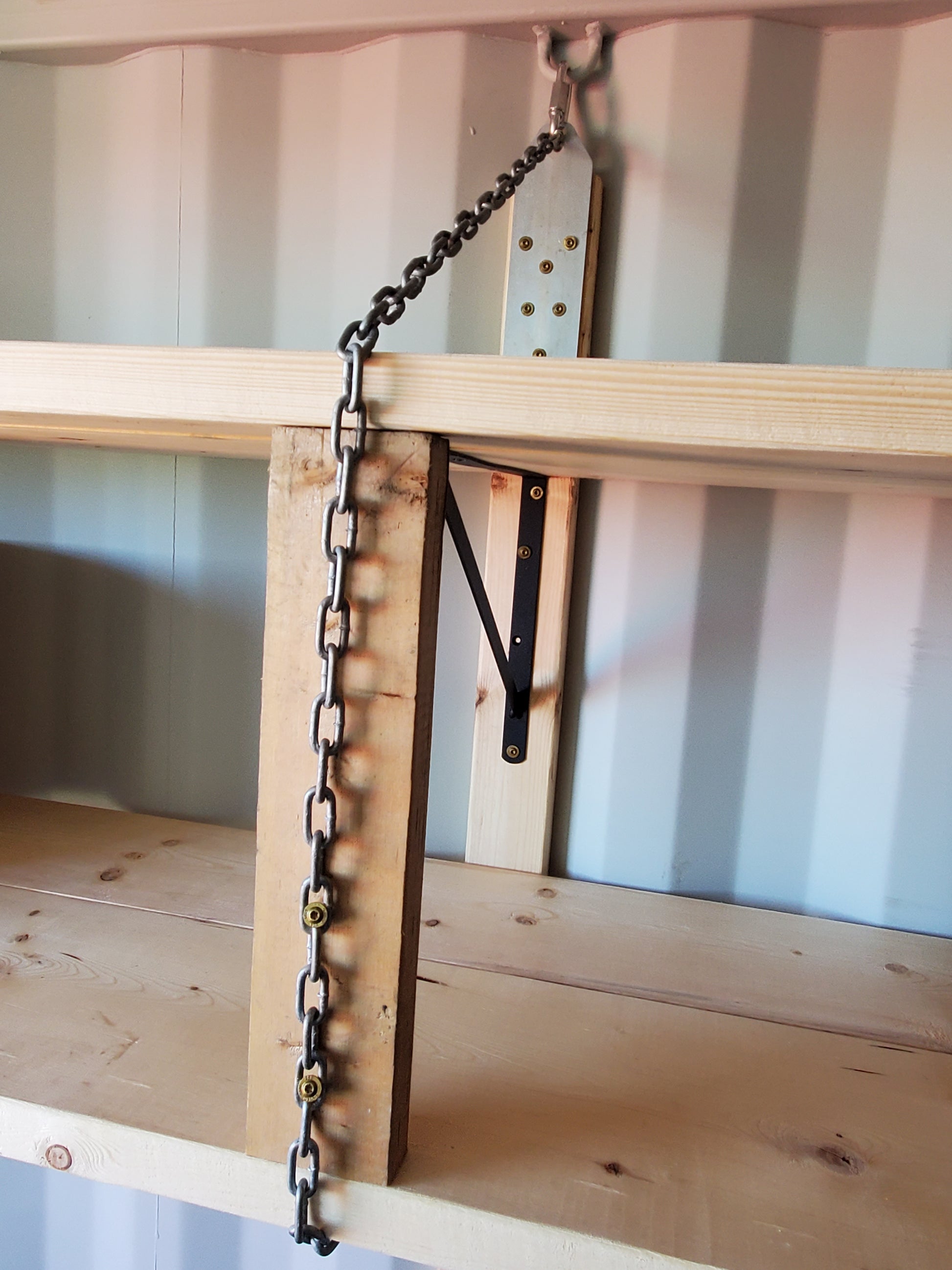 3/16" chain providing additional support for shelving in a container, using ZOOM container shelving kits.